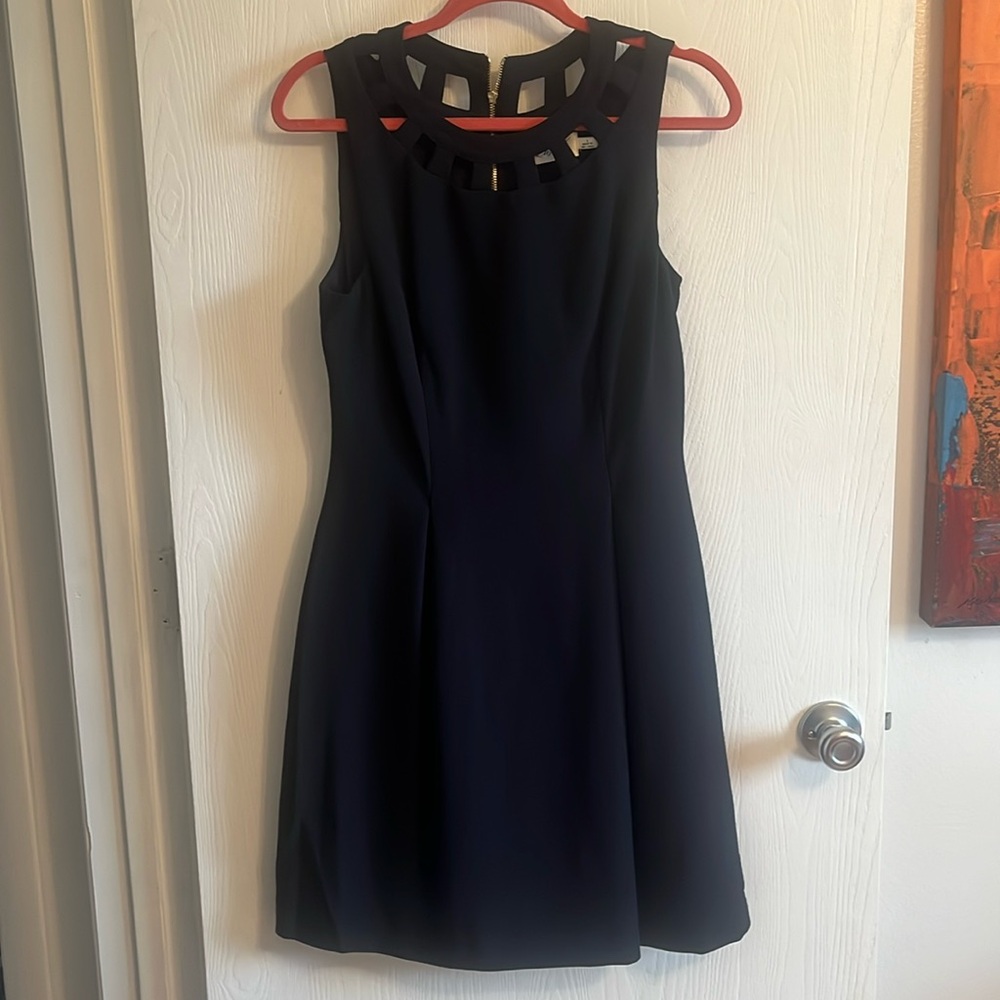 Eliza J short navy dress with next cut outs. Women’s size 6